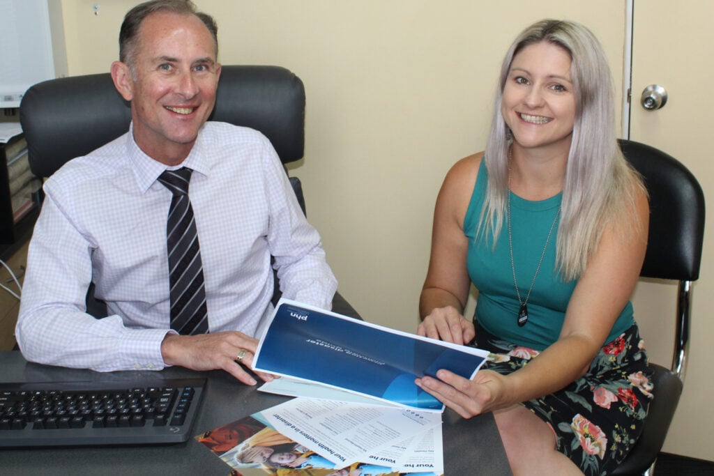 Owner and director of Macarthur General Practice, Dr Kenneth McCroary, is walked through the new guide by Alyssa Horgan from SWSPHN’s Disaster Response team.